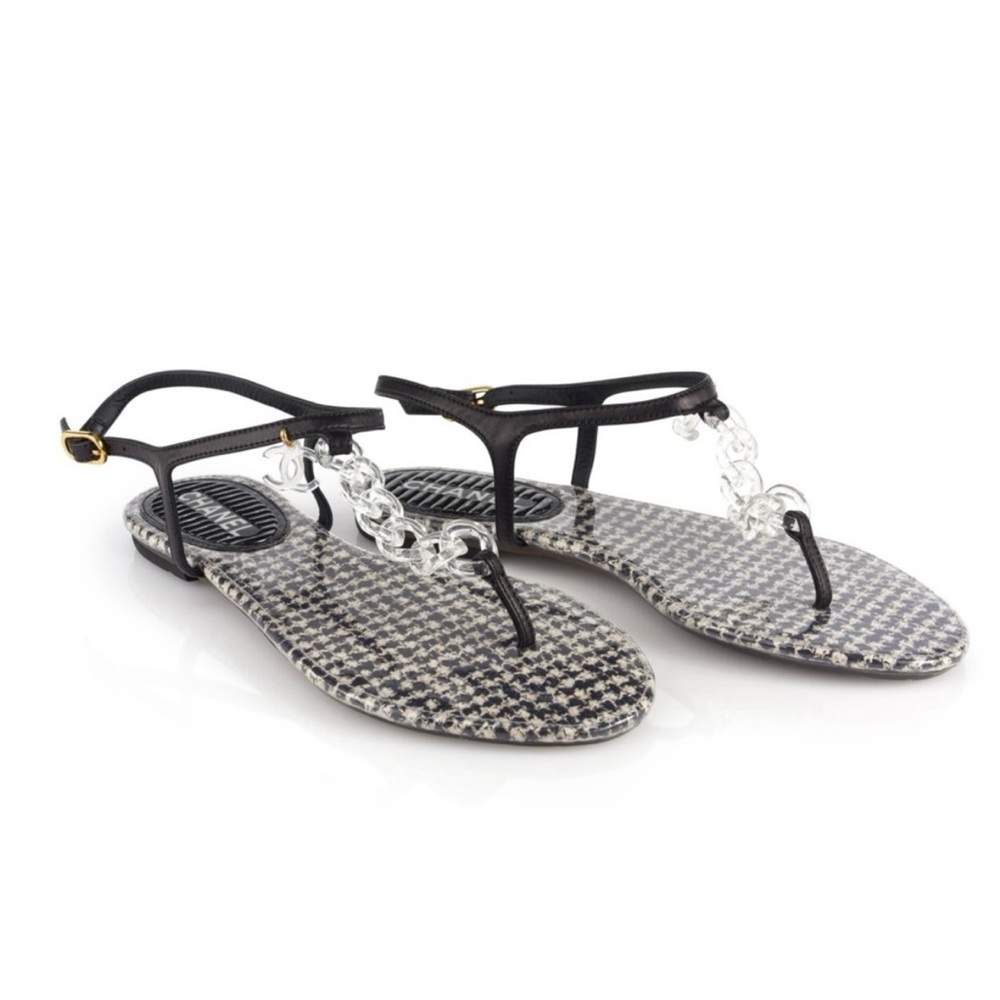 CHANEL | BLACK AND WHITE PVC AND LEATHER FLATS